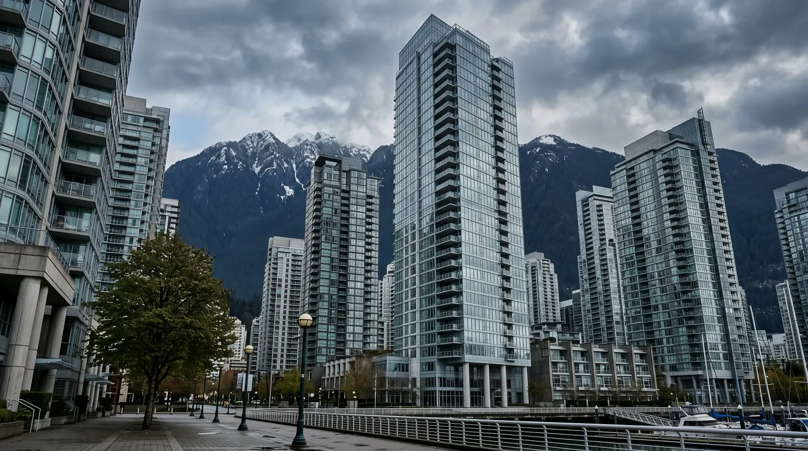 Vancouver skyline viewed from the water with downtown towers and North Shore mountains